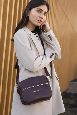 The Code Bandolera Rock piel burdeos Vino Outlet