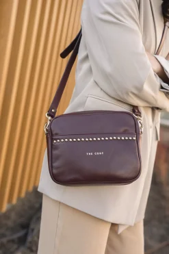 The Code Bandolera Rock piel burdeos Vino Outlet