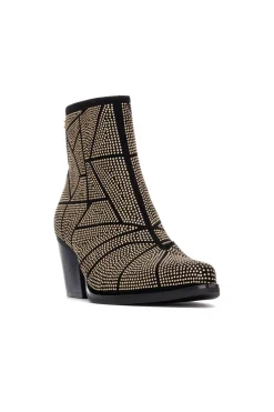 XTI Botín cowboy tachas Dorado