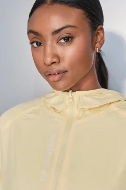 Dash and Stars Chaqueta ligera reversible capucha amarillo estampado New