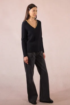 Molly Bracken Jersey de manga larga ribete dorado Negro