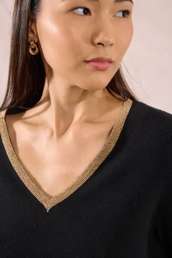 Molly Bracken Jersey de manga larga ribete dorado Negro