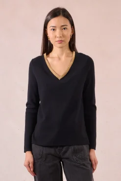 Molly Bracken Jersey de manga larga ribete dorado Negro