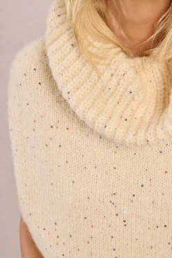 Molly Bracken Jersey de manga sisa cuello alto Marfil