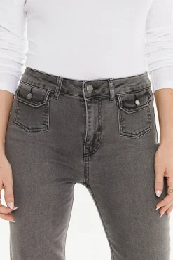 System Action Pantalón denim bolsillos plastrón negro