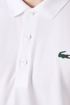 Lacoste Polo con ribetes en contraste en los hombros y los extremos de las mangas Blanco