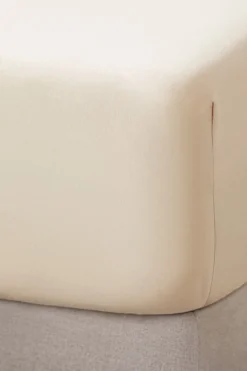 Bassols Sábana bajera sahara mate de algodón lavado Beige Online